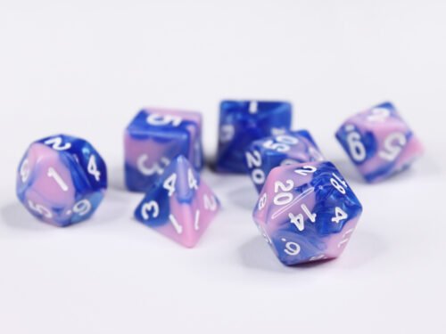 Collection of seven acrylic dice with swirled pale pink and blue colouring and white numbers