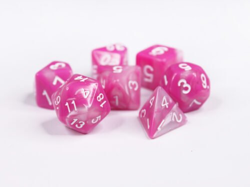 Collection of seven acrylic dice with swirled pearly pink and white colouring and white numbers