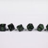 Cultist Sigil Poly-Dice Set containing seven different dice: a D20, D100, D12, D10, D8, D6 and a D4