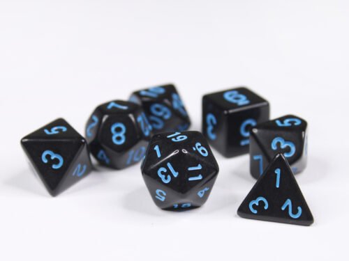 Collection of seven acrylic dice with plain black colouring and blue numbers