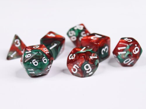 Collection of seven acrylic dice with swirled pearly red and green colouring and white numbers