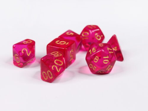 Collection of seven acrylic dice with clear magenta or hot pink colouring and gold numbers