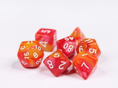 Collection of seven acrylic dice with swirled pearly red and orange colouring and white numbers