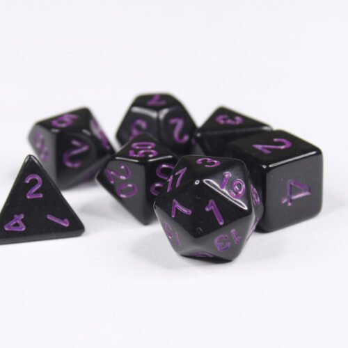 Collection of seven acrylic dice with plain black colouring and purple numbers