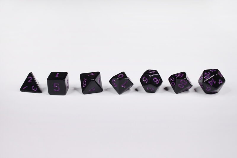Shadow Rogue Poly-Dice Set containing seven different dice: a D20, D100, D12, D10, D8, D6 and a D4