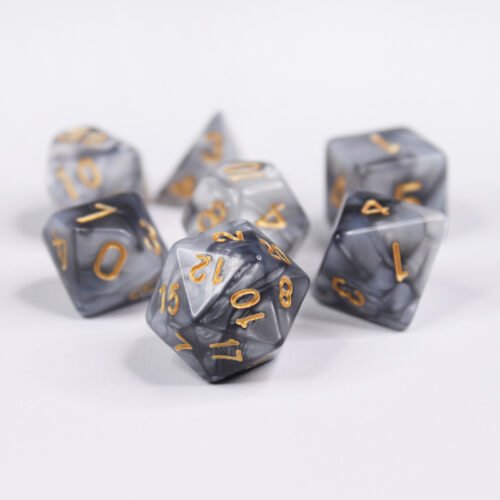Collection of seven acrylic dice with swirled pearly grey and silver colouring and gold numbers