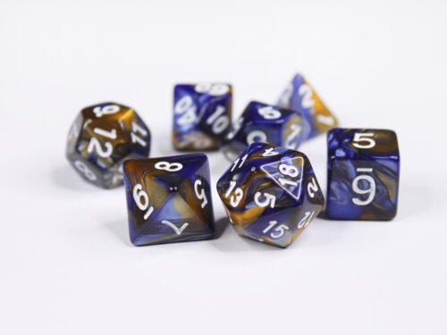 Collection of seven acrylic dice with swirled pearly gold and dark blue colouring and white numbers