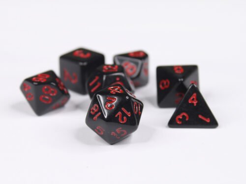 Collection of seven acrylic dice with plain black colouring and red numbers