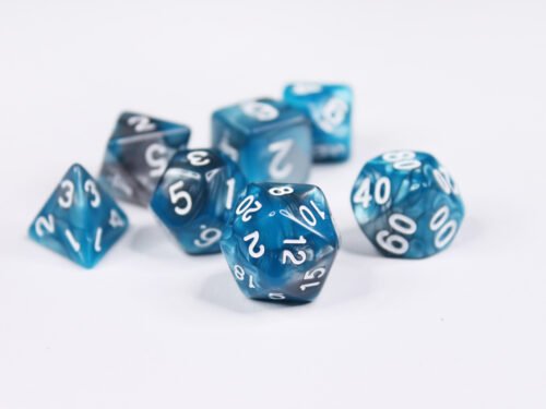 Collection of seven acrylic dice with swirled pearly turquoise and silver colouring and white numbers