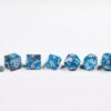 Will-o-the-Wisp Poly-Dice Set containing seven different dice: a D20, D100, D12, D10, D8, D6 and a D4