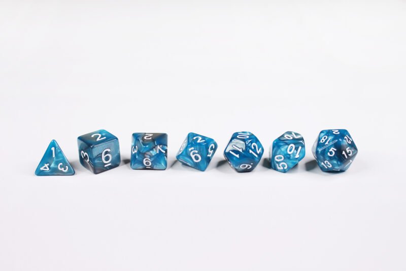 Will-o-the-Wisp Poly-Dice Set containing seven different dice: a D20, D100, D12, D10, D8, D6 and a D4