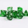 Collection of seven acrylic dice with clear forest green colouring and white numbers