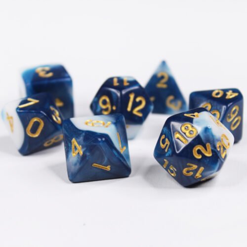 Collection of seven acrylic dice with swirled white and dark blue colouring and gold numbers