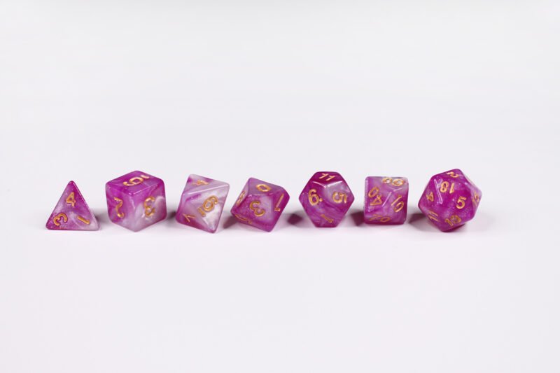 Unicorn Princess Poly-Dice Set containing seven different dice: a D20, D100, D12, D10, D8, D6 and a D4