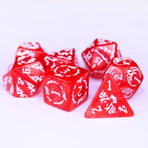 Collection of seven red dice with embossed dragon patterns and white coloured motif and numbering