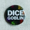 A button badge showing a green D6, A red D20 a yellow D8, an orange D12, a pink D10, a turquoise D D100, a purple D4 and the text Dice Goblin